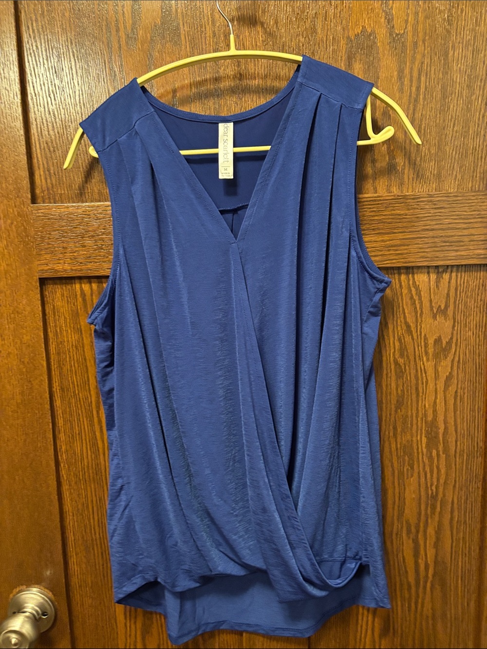 Dear Scarlett Sleeveless Navy Faux-Wrap Draped Top. Medium